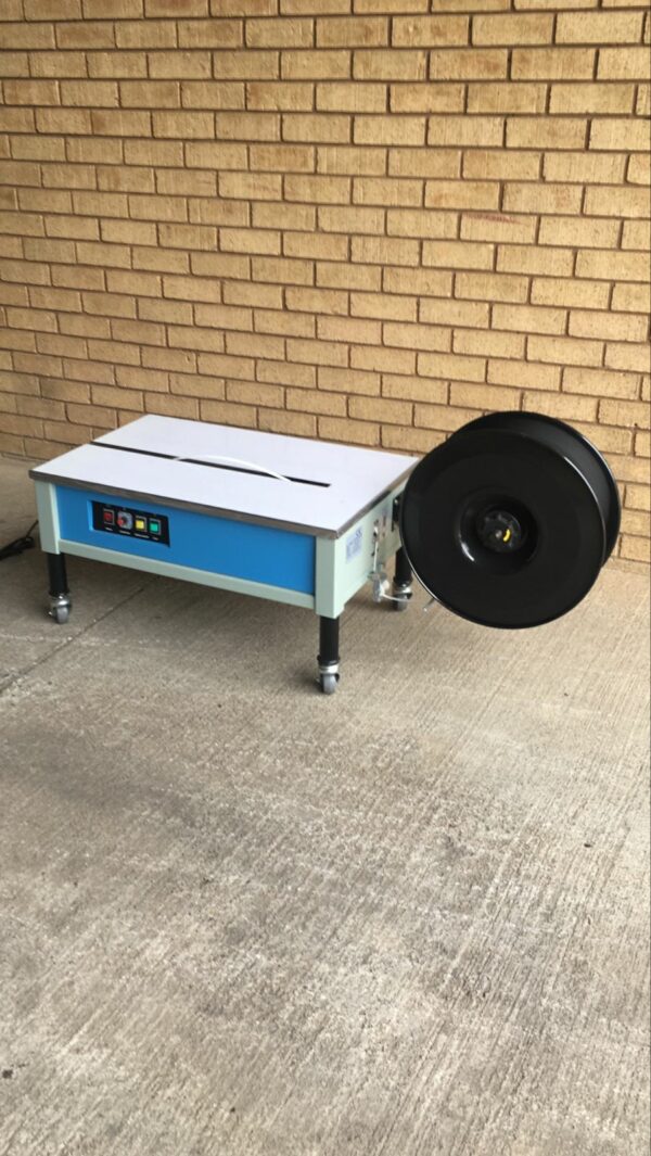 Low-table Outer adjustment semi-automatic strapping machine - Image 4