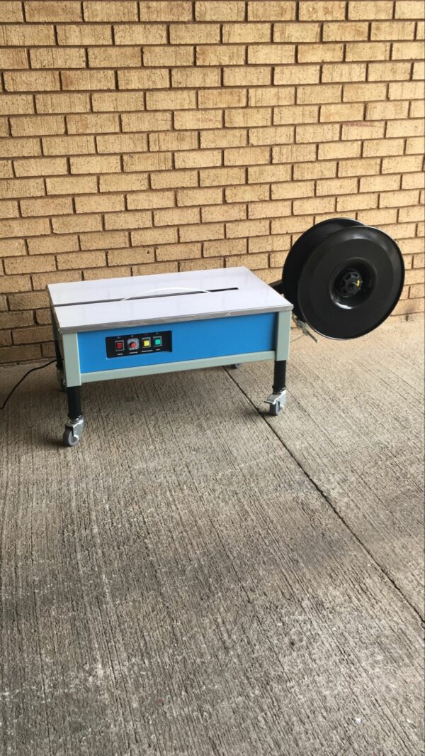 Low-table Outer adjustment semi-automatic strapping machine - Image 6